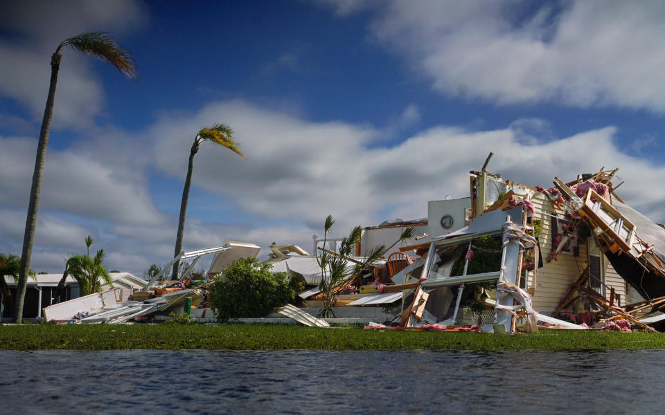 <p>Despite sunny skies on Sept. 29, winds continue to blow across damaged homes in Punta Gorda, Florida. </p>