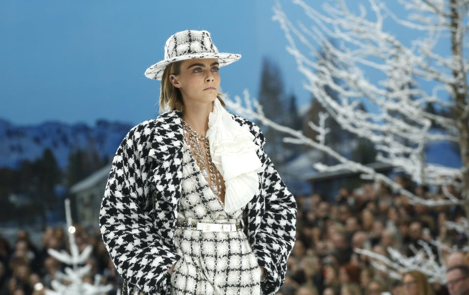 FILE - Model Cara Delevingne wears a creation as part of the Chanel ready to wear Fall-Winter 2019-2020 collection, that was presented in Paris on March 5, 2019. Delevingne turns 28 on Aug. 12. (AP Photo/Thibault Camus, File)