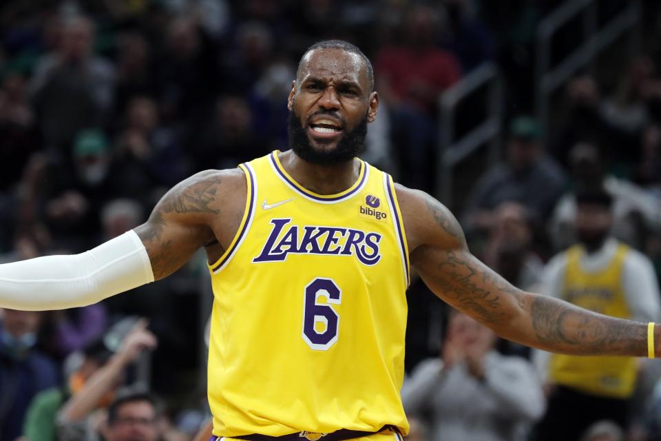 Los Angeles Lakers' LeBron James reacts to a call during the first half of an NBA basketball game against the Boston Celtics, Friday, Nov. 19, 2021, in Boston. (AP Photo/Michael Dwyer)