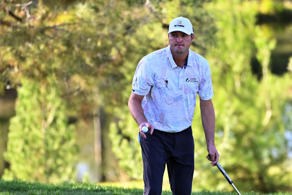 Jason Kokrak acknowledges the spectators after a putt during the final round of the CJ Cup golf tournament at Shadow Creek Golf Course Sunday, Oct. 18, 2020, in North Las Vegas. (AP Photo/David Becker)