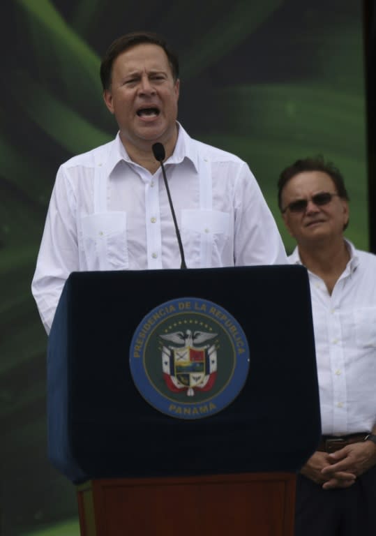 Panama's President Juan Carlos Varela has hailed the renovated canal as "the route that unites the world"