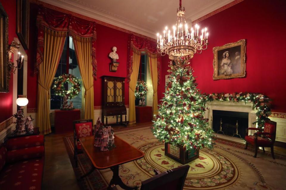 <p>First Lady Melania Trump chose a more traditional look for the 2019 decorations, including green pines rather than 2018's red versions. </p>