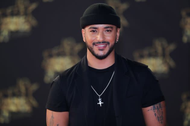 Le chanteur français Slimane Nebchi, ici sur le tapis rouge avant d'assister à la 20e cérémonie des NRJ Music Awards au Palais des Festivals, à Cannes, le 10 novembre 2018. (Photo: AFP)