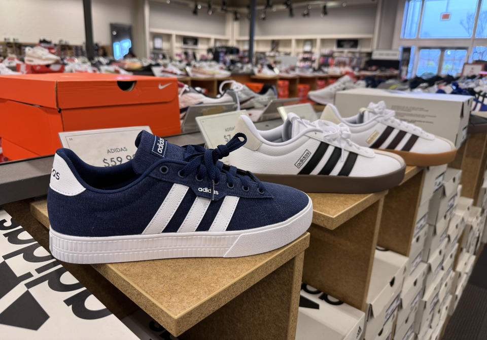 NOVATO, CALIFORNIA - JANUARY 31: Adidas shoes are displayed at a DSW store on January 31, 2024 in Novato, California. German sportswear maker Adidas reported a better-than-expected fourth quarter with an operating profit of 268 million euros in 2023 compared to an expected loss of $100 million after not writing off Yeezy inventory when they severed ties with rapper Ye, formerly known as Kanye West. (Photo by Justin Sullivan/Getty Images)