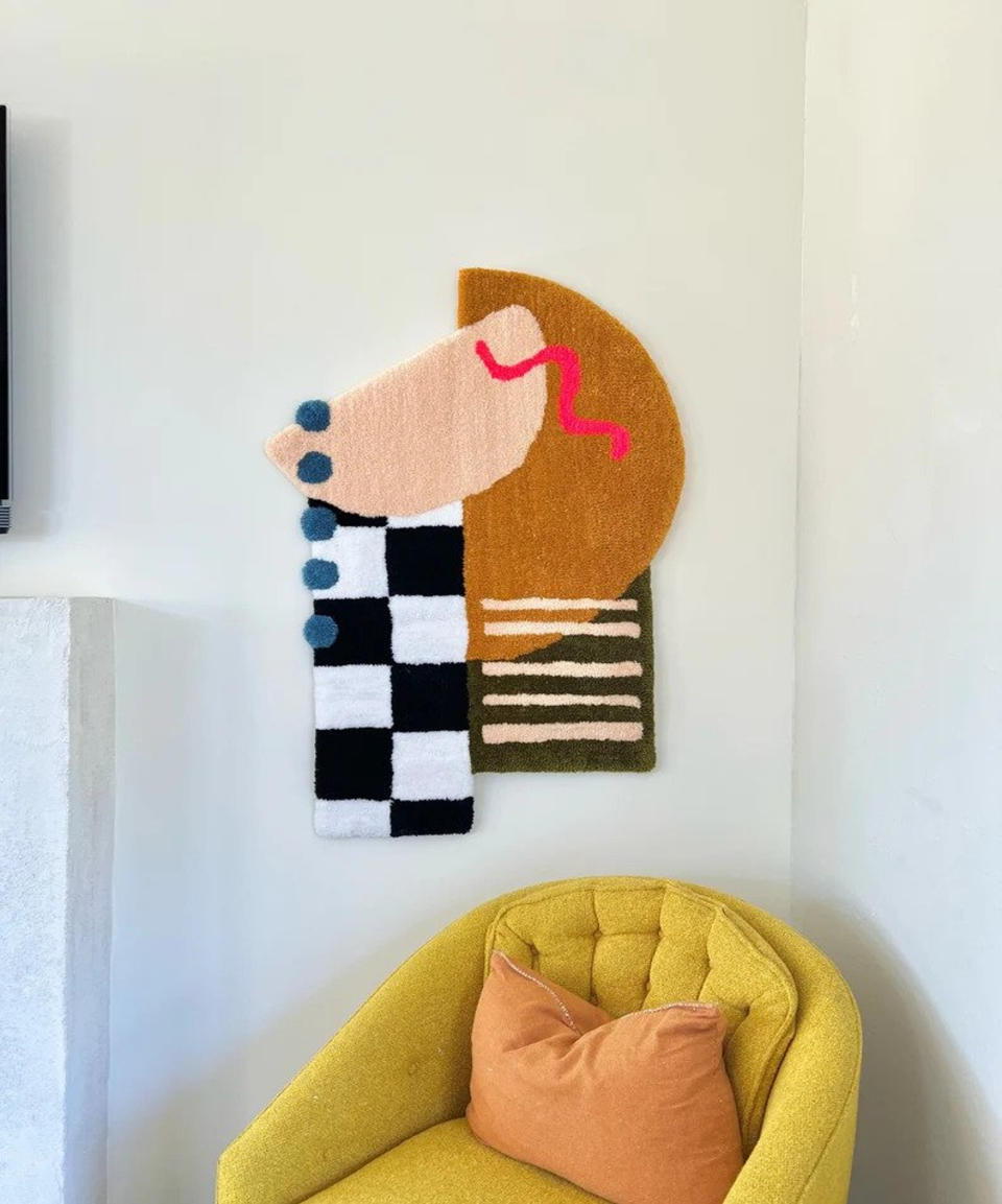 <p> If you thought that wall hangings were left in the seventies &#x2013; think again. These groovy hung textiles are the perfect way to add a tactile and cozy feel to your living room. </p> <p> Perhaps you&apos;re not the DIY type, so instead of handmaking this high-pile homeware - buy a small rug to hang instead. That way you can incorporate this boho living room idea without investing in too much time spent crafting... Unless of course you love to get creative with tapestry. </p>