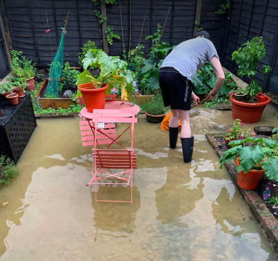 Raw sewage flooded some gardens in east London after the flooding (Handout)