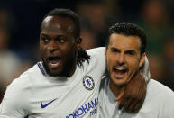 Soccer Football - Premier League - Burnley vs Chelsea - Turf Moor, Burnley, Britain - April 19, 2018 Chelsea's Victor Moses celebrates scoring their second goal with Pedro REUTERS/Andrew Yates