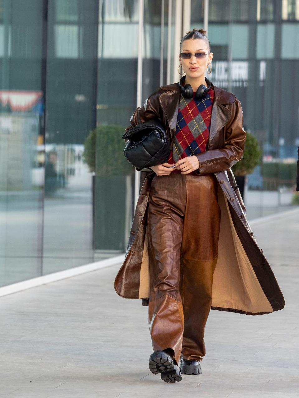 bella hadid plaid and oversized leather coat