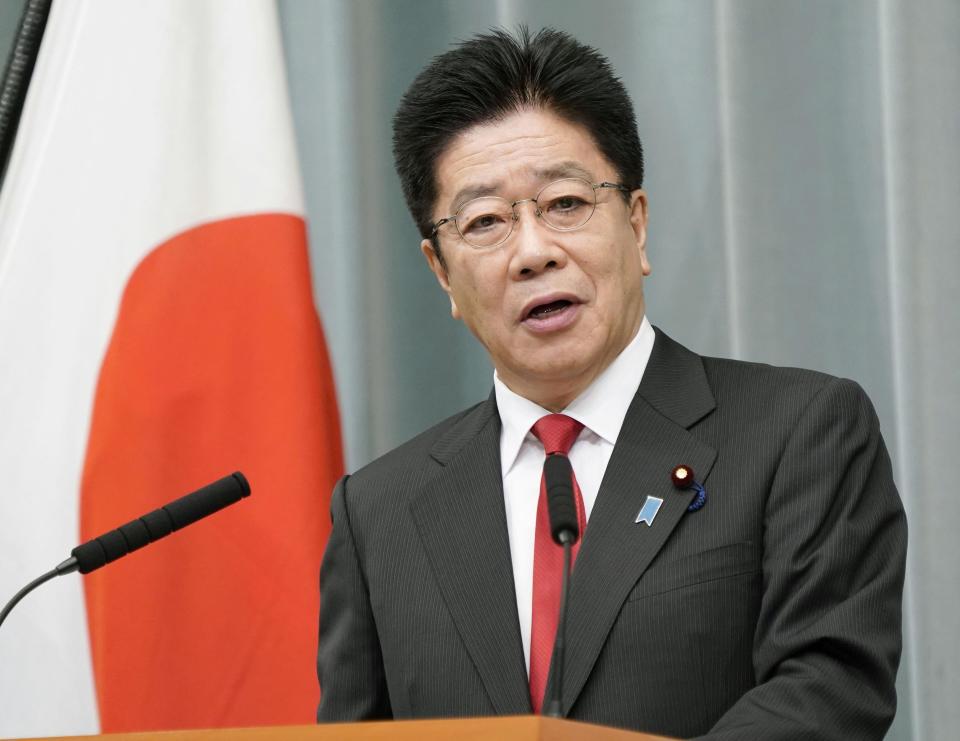 Chief Cabinet Secretary Katsunobu Kato speaks during a press conference at the prime ministers office in Tokyo Monday, Oct. 26, 2020. Japan said it will not sign a U.N. treaty to ban nuclear weapons and did not even welcome its entry into force next year, rejecting wishes of atomic bombing survivors for their own government to join their move to achieve a nuclear free world.(Kyodo News via AP)