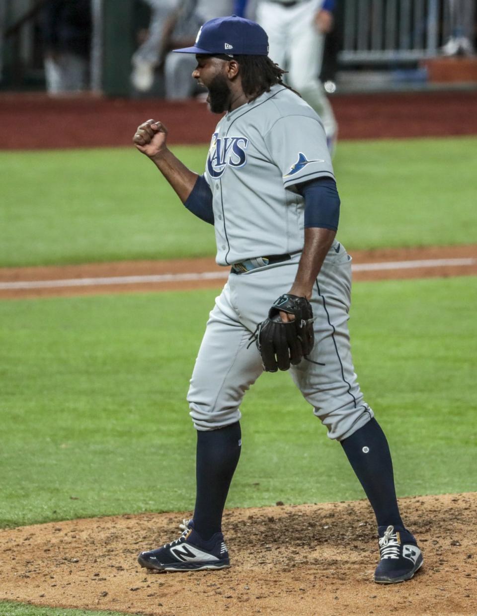 Tampa Bay Rays relief pitcher Diego Castillo celebrates after closing out a 6-4 win in Game 2 of the World Series.