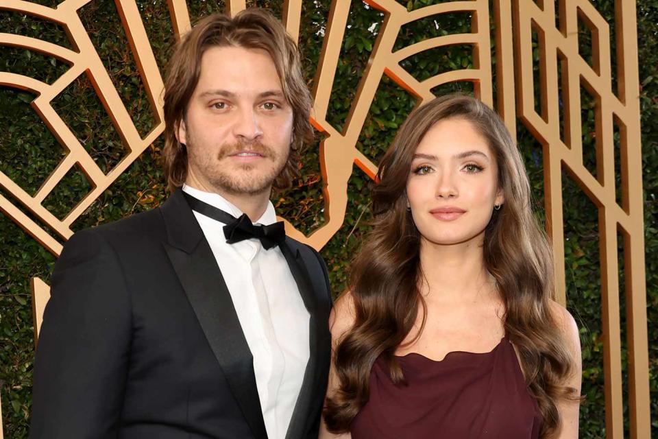 <p>Amy Sussman/WireImage</p> Luke Grimes and wife Bianca Rodrigues Grimes at the 28th SAG Awards on Feb. 27, 2022, in Santa Monica, California