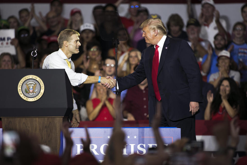 Donald Trump, right, shakes hands with Rep. Jim Jordan,&nbsp;who is accused of ignoring sexual assault of a dozen athletes by a former physician at Ohio State University while he was an assistant coach there. (Photo: Bloomberg via Getty Images)
