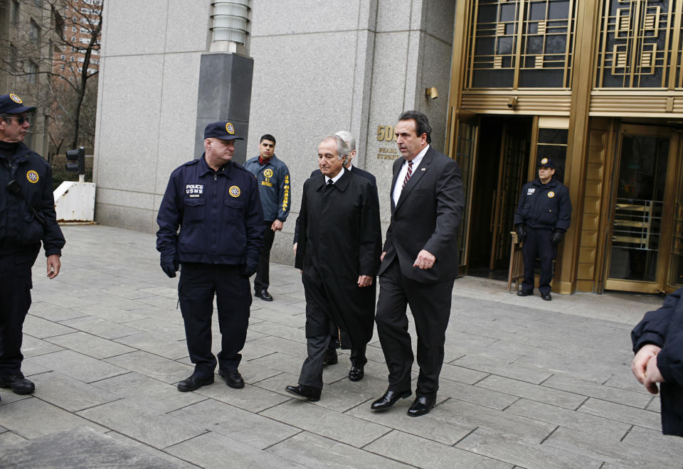 Bernie Madoff, known as the mastermind of the biggest financial fraud in American history, departs court following a hearing in New York, March 9, 2009.<span class="copyright">Damon Winter—The New York Times/Redux</span>