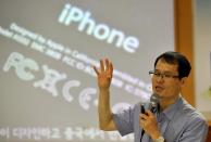 Kwon Jang-Hee, head of a major civic group campaigning against digital addiction, speaks during a clinic for smartphone addiction, at a church in Seoul, on June 8, 2013. South Korea, after boasting for years advanced technology from high-speed Internet to Samsung smartphones, is now taking pains to try to pull its tech-crazed youth away from digital addiction