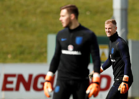 Soccer Football - England Training & Media Day - St. George’s Park, Burton Upon Trent, Britain - March 20, 2018 England's Joe Hart and Jack Butland during training Action Images via Reuters/Andrew Boyers