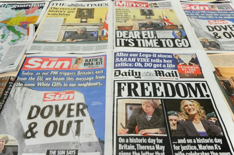 The front pages of Britain's national newspapers pictured in London on March 29, 2017, featuring British Prime Minister Theresa May's signing of a letter to invoke the provisions laid out in Article 50