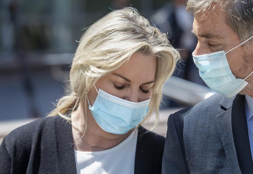 VAN NUYS, CA-APRIL 25, 2022: Rebecca Grossman, co-founder of the Grossman Burn Foundation, leaves Van Nuys Courthouse during a break from her preliminary hearing. Grossman is charged with murder and other counts stemming from a crash in Westlake Village that left two young brothers dead. (Mel Melcon / Los Angeles Times)