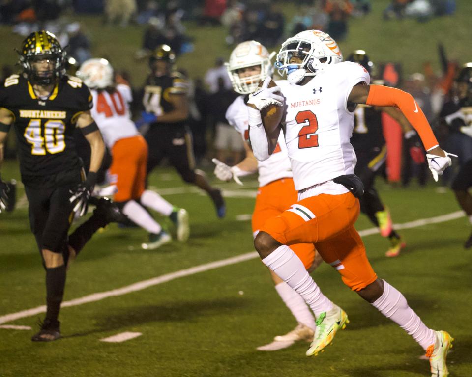 East Lincoln's Keandre Walker returns a punt for a touchdown in his team's 46-20 win over Kings Mountain in the 3A West semifinal game.