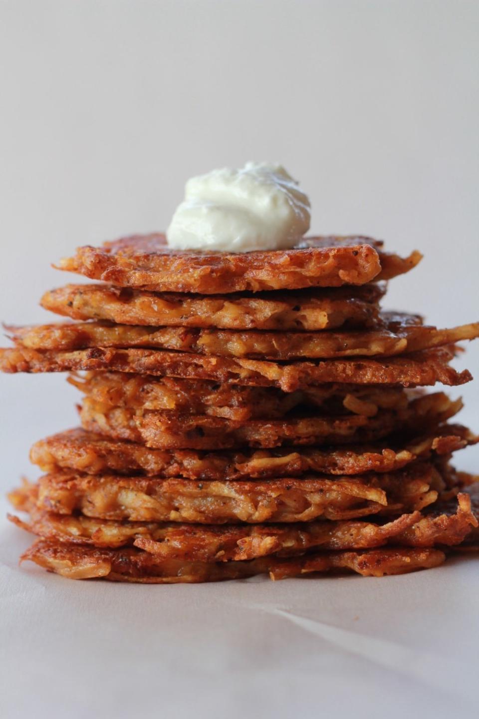 <strong>Get the <a href="http://www.halfbakedharvest.com/chipotle-cheddar-potato-latkes/">Cheddar Chipotle Potato Latkes recipe</a>&nbsp;from Half Baked Harvest</strong>