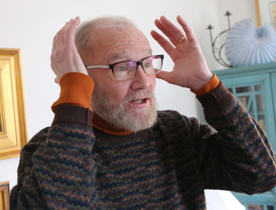 Portsmouth resident Mark Brighton, seen in his home Thursday, March 9, 2023, describes the crowded space he encountered recently in a trip to the emergency room.