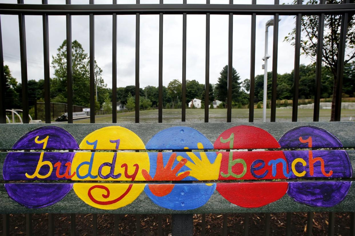 A playground bench is colorfully decorated at the new Sandy Hook Elementary School, which replaced the one torn down after a gunman killed 20 first graders and six educators in 2012. <a href="https://newsroom.ap.org/detail/CORRECTIONNewtownShootingNewSchool/5b3479f3c6bb40bb8c67230445d676b9/photo?Query=Newtown%20Shooting%20New%20School&mediaType=photo&sortBy=&dateRange=Anytime&totalCount=259&currentItemNo=9" rel="nofollow noopener" target="_blank" data-ylk="slk:AP Photo/Mark Lennihan;elm:context_link;itc:0;sec:content-canvas" class="link ">AP Photo/Mark Lennihan</a>