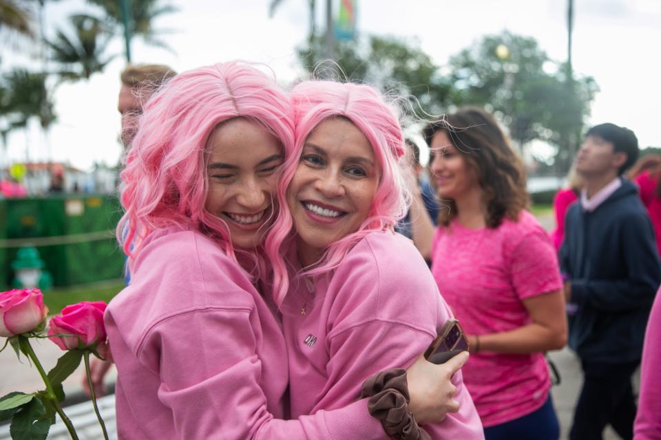 Jacqueline Vertucci, Palm Beach Gardens, left, hugs her mother, Esperanza, who was diagnosed with cancer nine months prior to the walk in 2023.