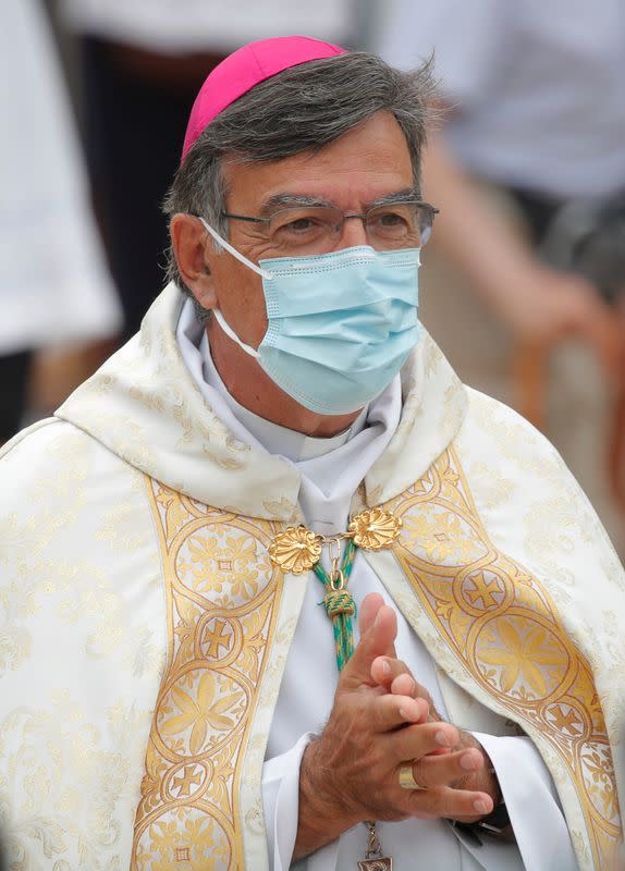 French Catholics gather at Notre Dame Cathedral square