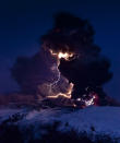 Lightning branches out from behind a veil of ash clouds at Iceland's Eyjafjallajökull volcano in April 2010. Photograph by David Jon, NordicPhotos/Getty Images <br><br><a href="http://news.nationalgeographic.com/2012/06/pictures/120611-volcano-lightning-volcanic-redoubt-eos-science/" rel="nofollow noopener" target="_blank" data-ylk="slk:Click here;elm:context_link;itc:0;sec:content-canvas" class="link ">Click here</a> to see more National Geographic photos.