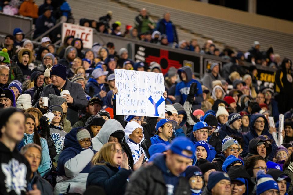 BYU fans cheer as the Cougars face Southern Methodist in the New Mexico Bowl.