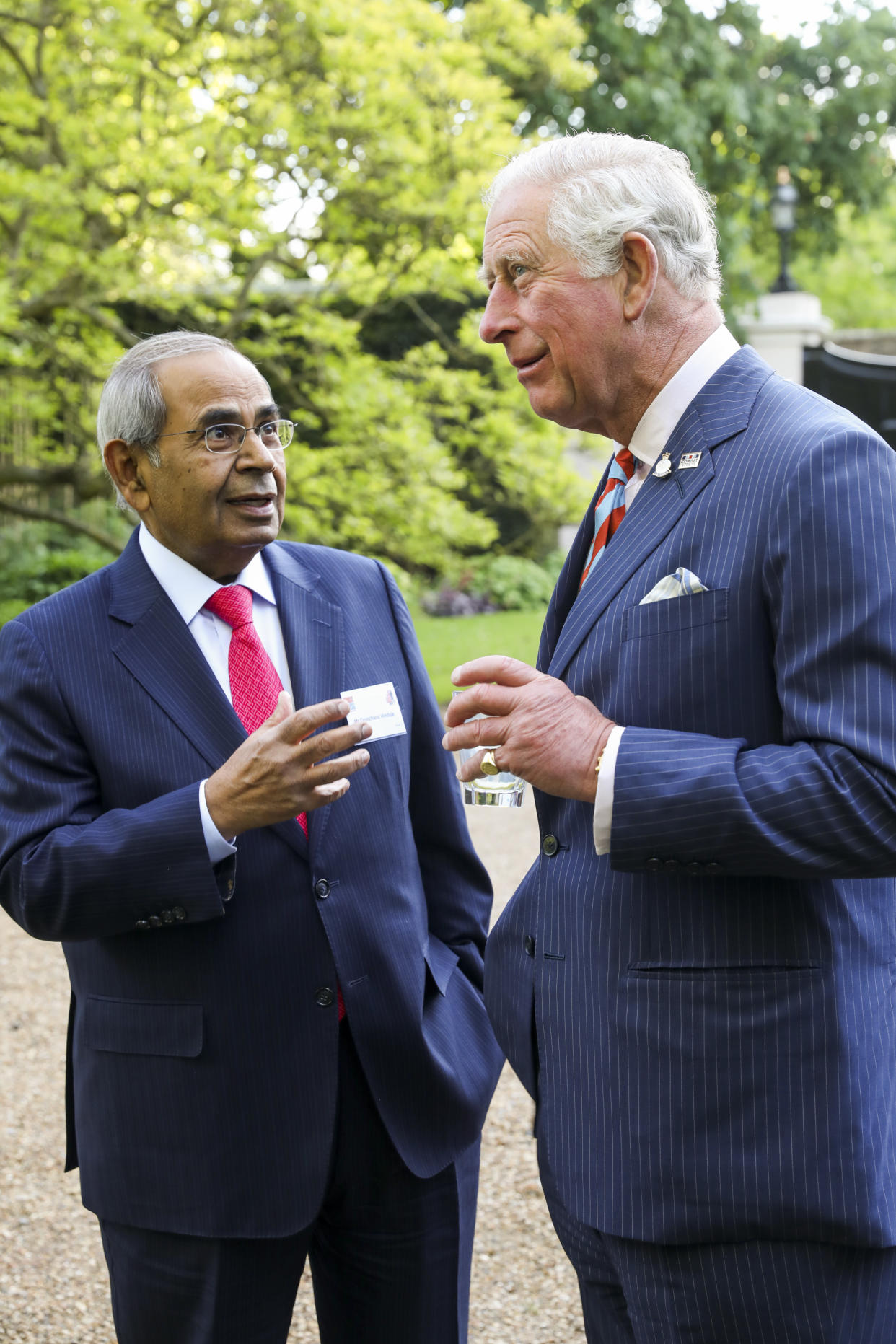 LONDON, ENGLAND - MAY 13: Prince Charles, Prince of Wales meets Gopichand Hinduja during a reception by charity Combat Stress to launch The At Ease Appeal at St James Palace on May 13, 2019 in London, England. (Photo by Tristan Fewings - WPA Pool / Getty Images)