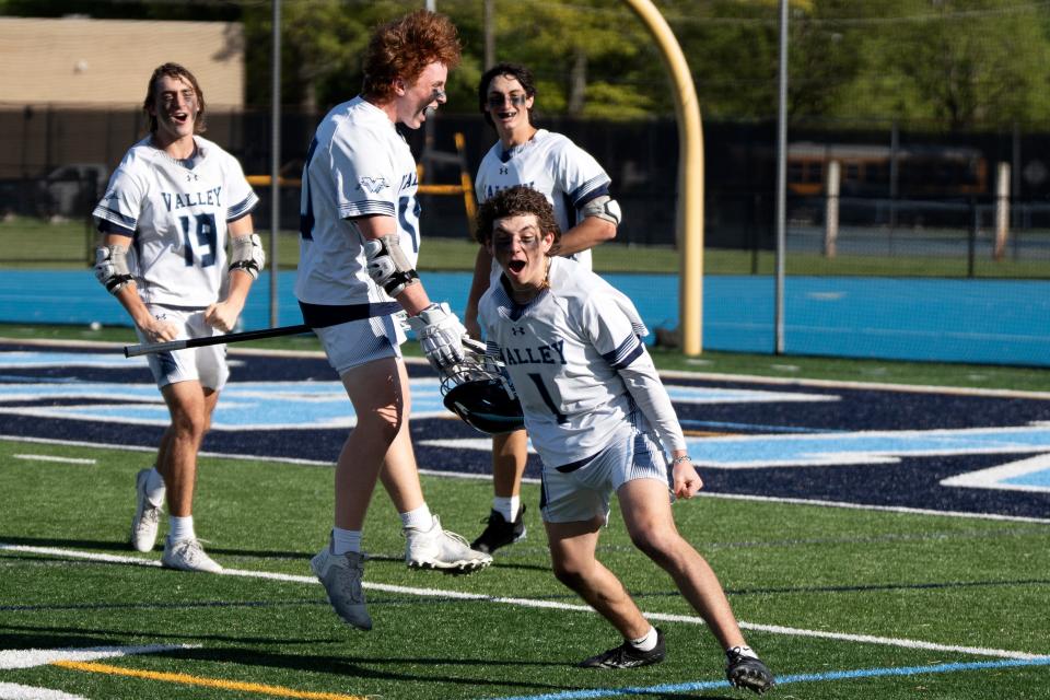 West Milford at Wayne Valley in the Passaic County boys lacrosse final on Saturday, May 6, 2023. Wayne Valley celebrates defeating West Milford.