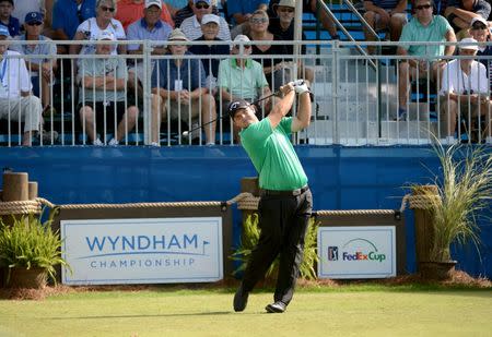 Aug 18, 2016; Greensboro, NC, USA; Patrick Reed tees off on the first hole during the first round of the 2016 Wyndham Championship at Sedgefield Country Club. Mandatory Credit: Rob Kinnan-USA TODAY Sports