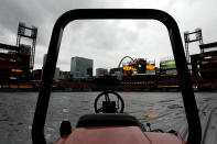 ST LOUIS, MO - OCTOBER 19: A rain tarp covers the infield at Busch Stadium prior to Game One of the MLB World Series between the Texas Rangers and St Louis Cardinals on October 19, 2011 in St Louis, Missouri. (Photo by Rob Carr/Getty Images)