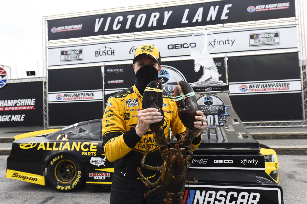 Brad Keselowski and his winner's lobster. (Photo by Jared C. Tilton/Getty Images)