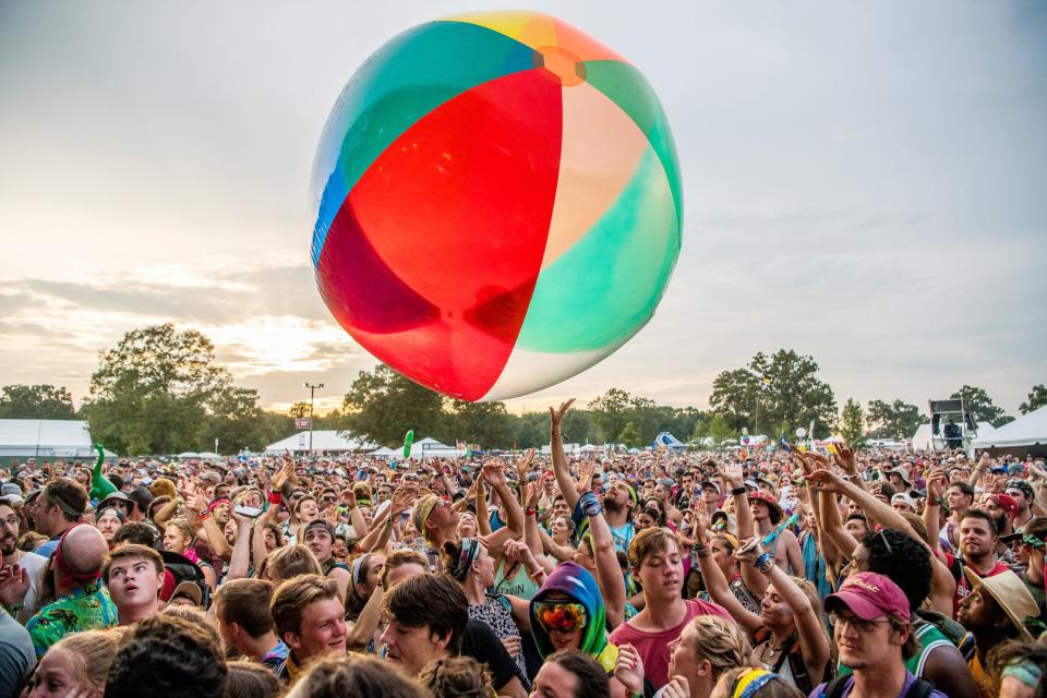 The crowd passes around a giant inflatable ball as Moon Taxi performs at Bonnaroo in 2018.