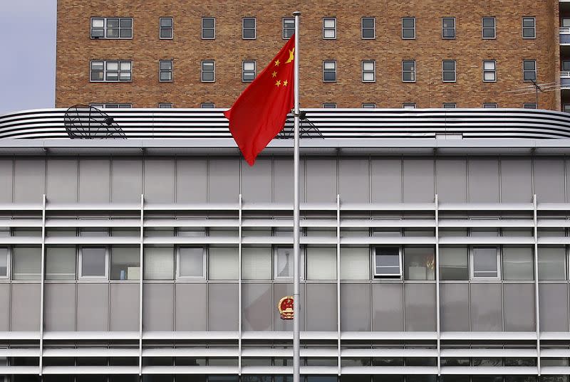 The Chinese national flag hangs from a flag pole inside the Chinese consulate in Sydney, Australia