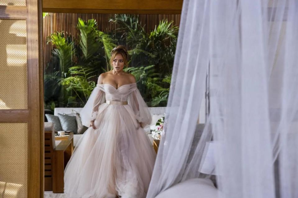 Sharon Sever, head designer at Galia Lahav, designed Jennifer Lopez’s dress in the 2022 comedy action film “Shotgun Wedding.” He told The Post it required more than two dozen copies of the same puff-sleeve wedding dress. Amazon Studios