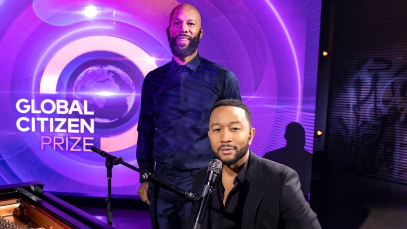 Global Citizen Prize -- NBC TV Special, GLOBAL CITIZEN -- "Global Citizen Prize" -- Pictured: (l-r) Common, John Legend -- (Photo by: Christopher Polk/NBC) Common, left, and John Legend in "Global Citizen Prize" on NBC.