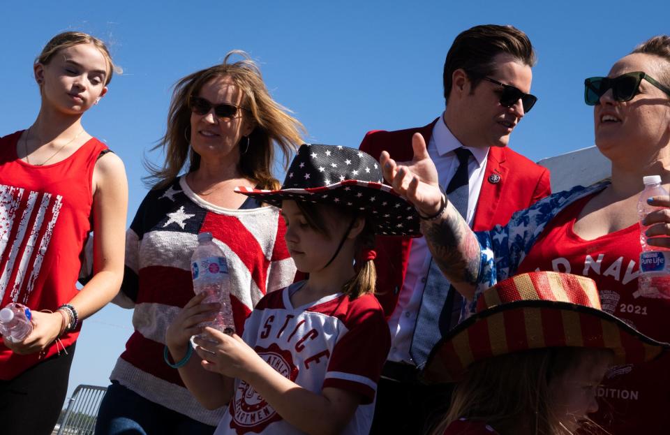 Florida representative Matt Gaetz takes photos with fans waiting to enter Donald Trump's Make America Great Again Rally in Waco, Texas, Saturday morning, March 25, 2023.