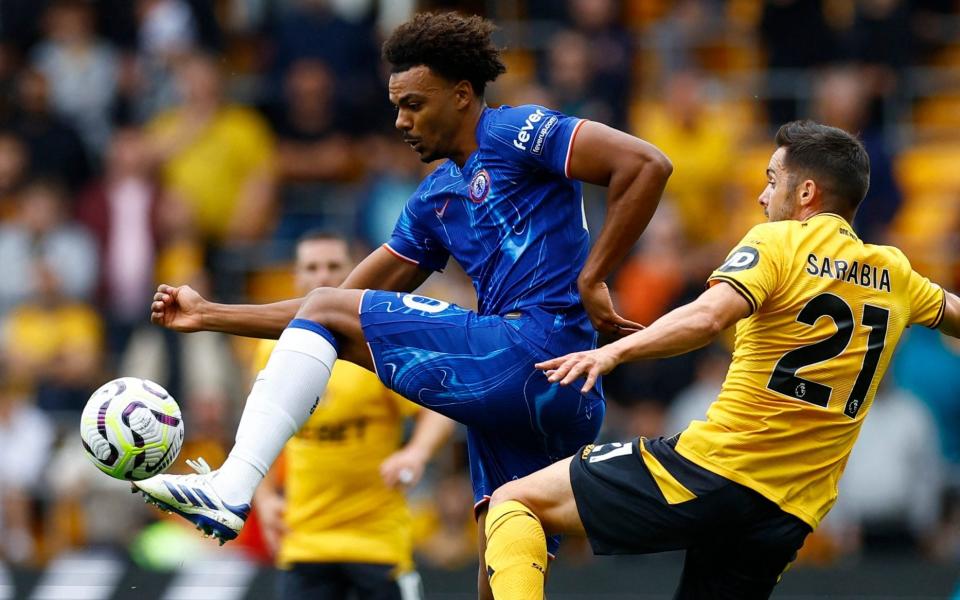 Chelsea's Renato Veiga escapes the attentions of Wolverhampton Wanderers' Pablo Sarabia during his side's 6-2 Premier League win, August 25, 2024