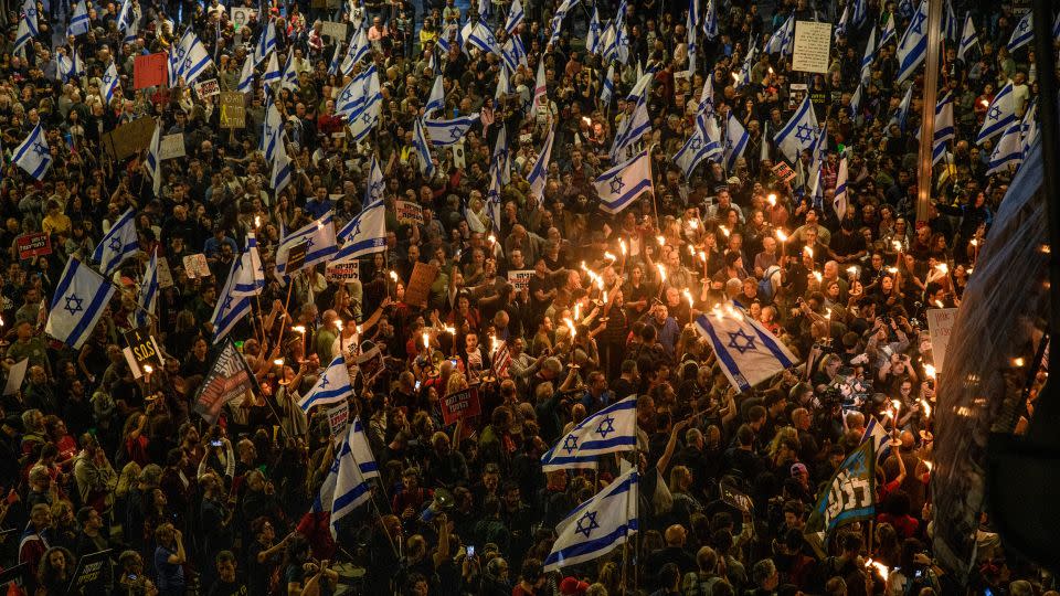 Tens of thousands of Israelis demonstrate with the hostages families against Prime Minister Benjamin Netanyahu in Tel Aviv, demanding an immediate hostage deal and general elections, in Tel Aviv, Israel on April 6. - Matan Golan/Sipa/AP