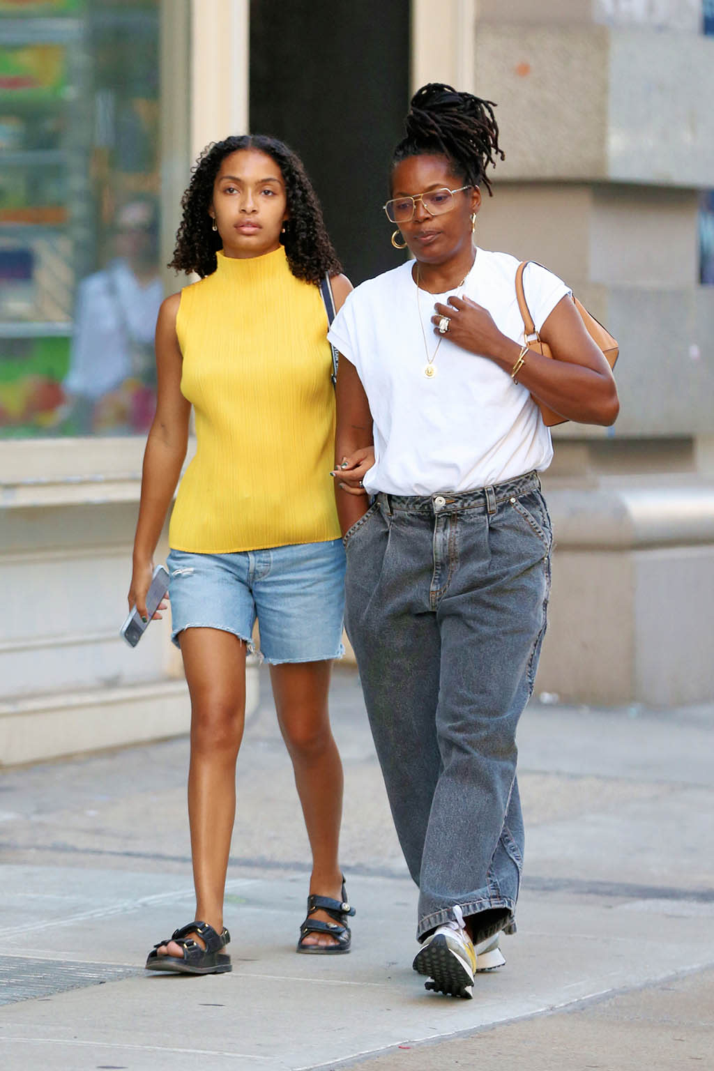 (L-R) Yara Shahidi and her mother Keri Shahidi take a stroll in New York City on August 14, 2022. - Credit: Christopher Peterson / SplashNew