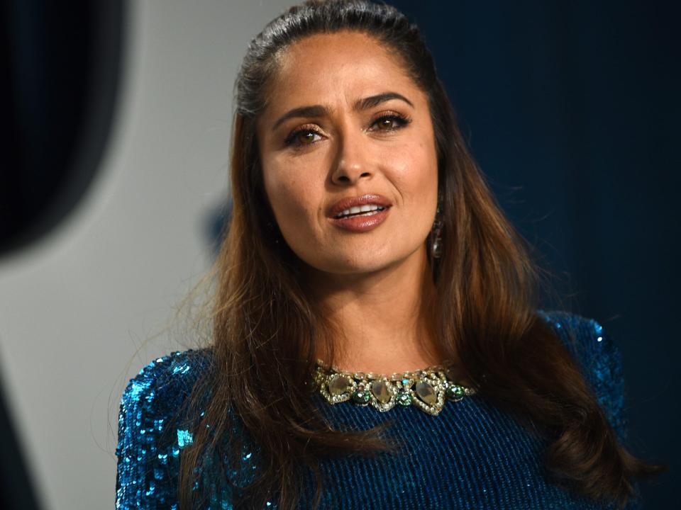 Salma Hayek wearing a sparkling blue dress in February 2020.