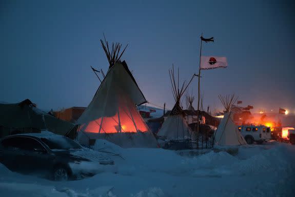 Activists at Oceti Sakowin near the Standing Rock Sioux Reservation brace for sub-zero temperatures, Dec. 6, 2016.