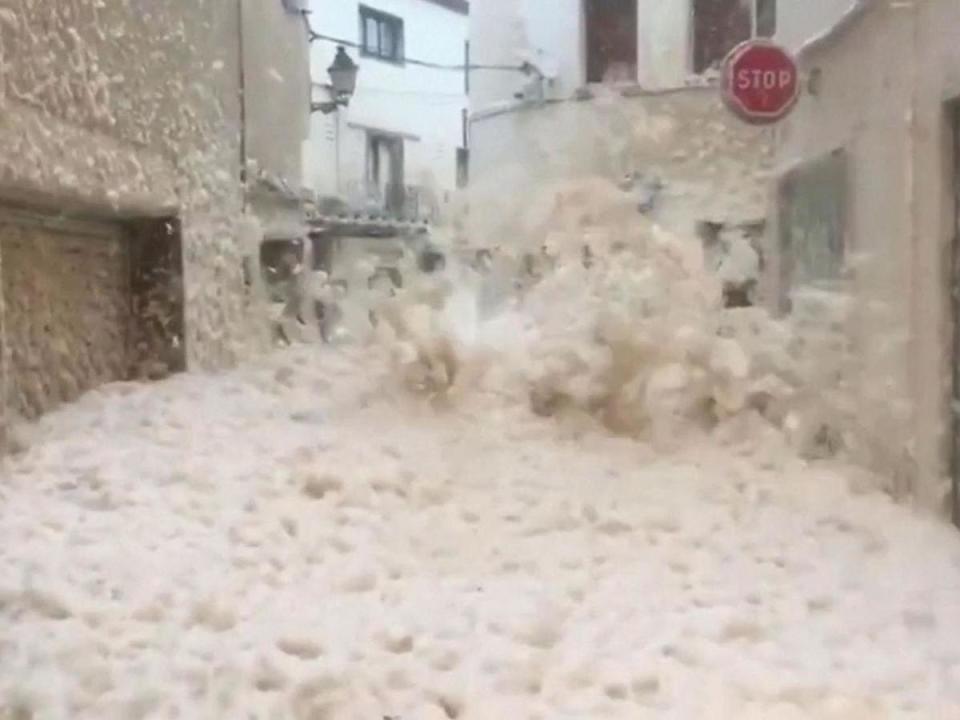 The Spanish town of Tossa del Mar has been inundated with sea foam amid a deadly storm