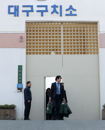 South Korean conscientious objectors walk out from Daegu detention center in Daegu, South Korea, November 30, 2018. Yonhap via REUTERS