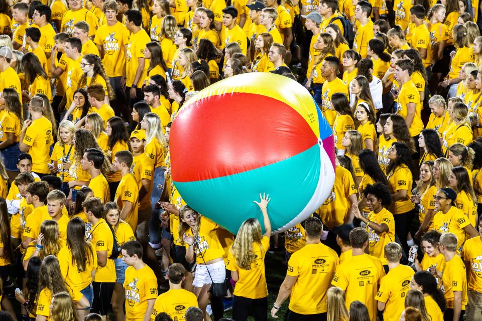 University of Iowa students play with a large beach ball during Kickoff at Kinnick on Aug. 23, 2019, at Kinnick Stadium in Iowa City, Iowa.