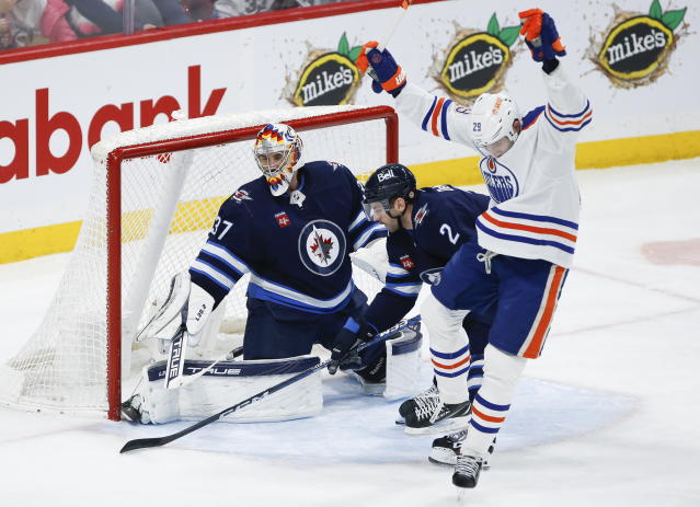 Morrissey has 2 goals, assist as Jets outlast Oilers 7-5 - The San