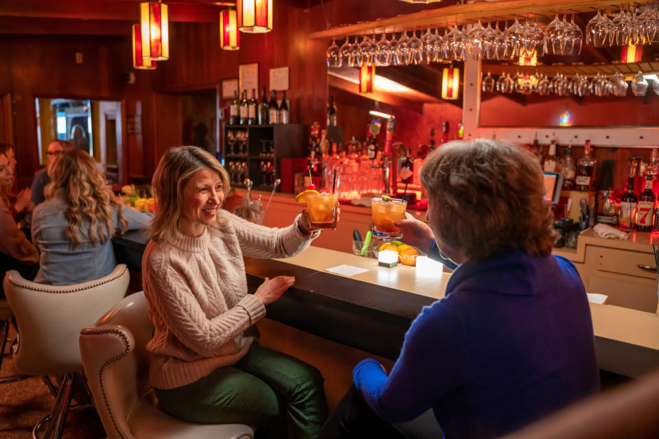 PBS travel TV host Samantha Brown shares an old-fashioned with writer Mary Bergin  at Tornado Club Steak House in Madison, in a scene from an episode of "Samantha Brown's Places to Love" featuring Madison, Wisconsin.