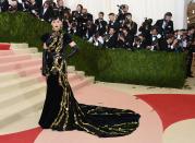 <p>Katy bought glamorous goth vibes to the Manus x Machina Met Gala in this Prada number. [Photo: Getty] </p>